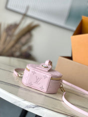 MINI BOITE CHAPEAU 13 IN LIGHT PINK MONOGRAM PERFORATED CALFSKIN