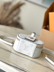 MINI BOITE CHAPEAU 13 IN WHITE MONOGRAM PERFORATED CALFSKIN