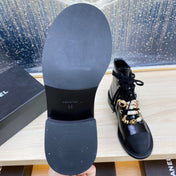 CC COMBAT BOOTS IN BLACK WRINKLED CALFSKIN AND GROSGRAIN WITH FAUX PEARL