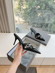 CRYSTAL BUCKLE BLACK WAX-OIL SHEEPSKIN HEELED MULES