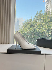 ZIPPER POINTED-TOE HIGH PUMPS IN WHITE WAX-OIL SHEEPSKIN