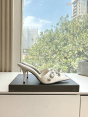 CRYSTAL BUCKLE WHITE CALFSKIN HEELED MULES