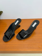 ALAIA WEDGE SANDALS 25S IN BLACK LAMBSKIN
