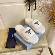PRADA 26S SLIDE SANDALS IN WHITE LOGO RAFFIA