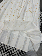 WHITE FLARED SKIRT WITH PRINT