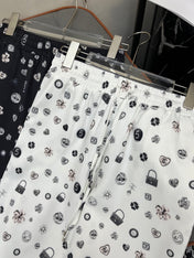 ALL-OVER LOGO PRINTED PANTS WITH STRETCH WAIST