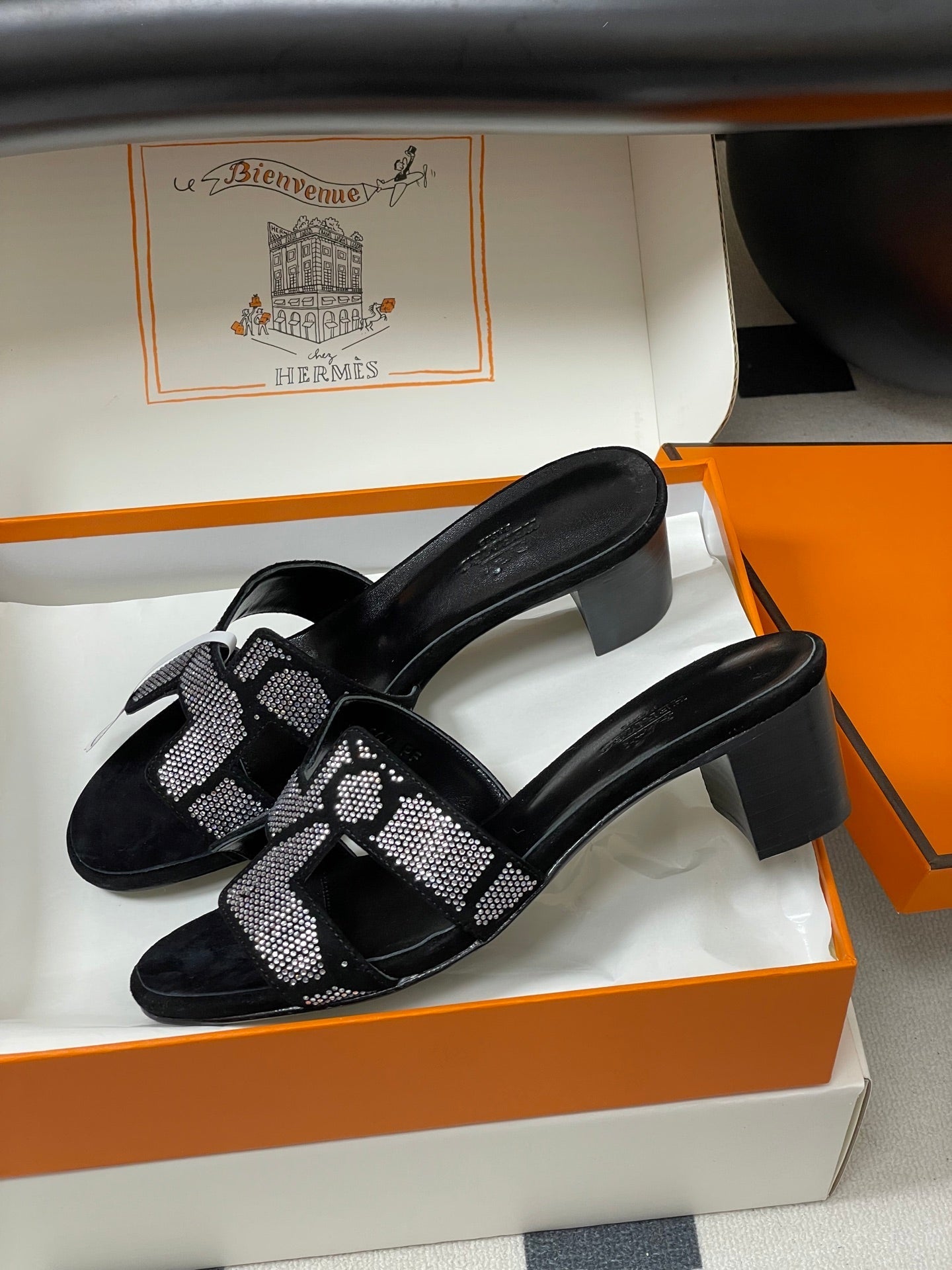 HM 25S ORAN HIGH‑HEEL SANDAL 50 MM IN BLACK LAMBSKIN WITH WHITE STONE DETAILS