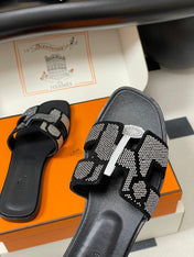 HM 25S ORAN SANDAL IN BLACK LAMBSKIN WITH WHITE STONE DETAILS
