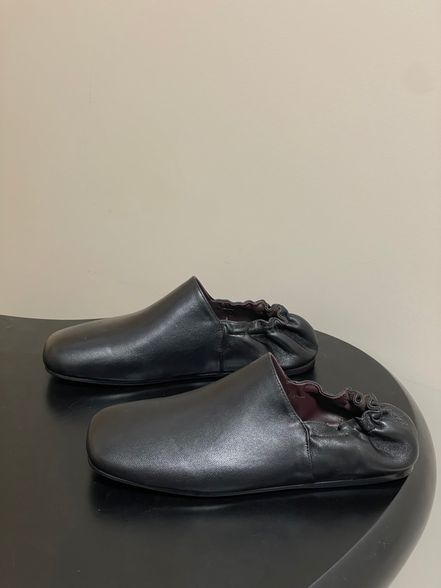 CELINE 26S ELASTIC-BACK FLAT SHOES IN BLACK LAMBSKIN