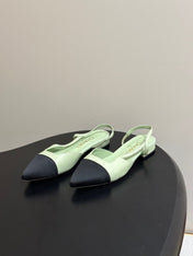 CHANEL 26S POINTED TOE SLINGBACKS IN PASTEL GREEN LAMBSKIN AND BLACK FABRIC