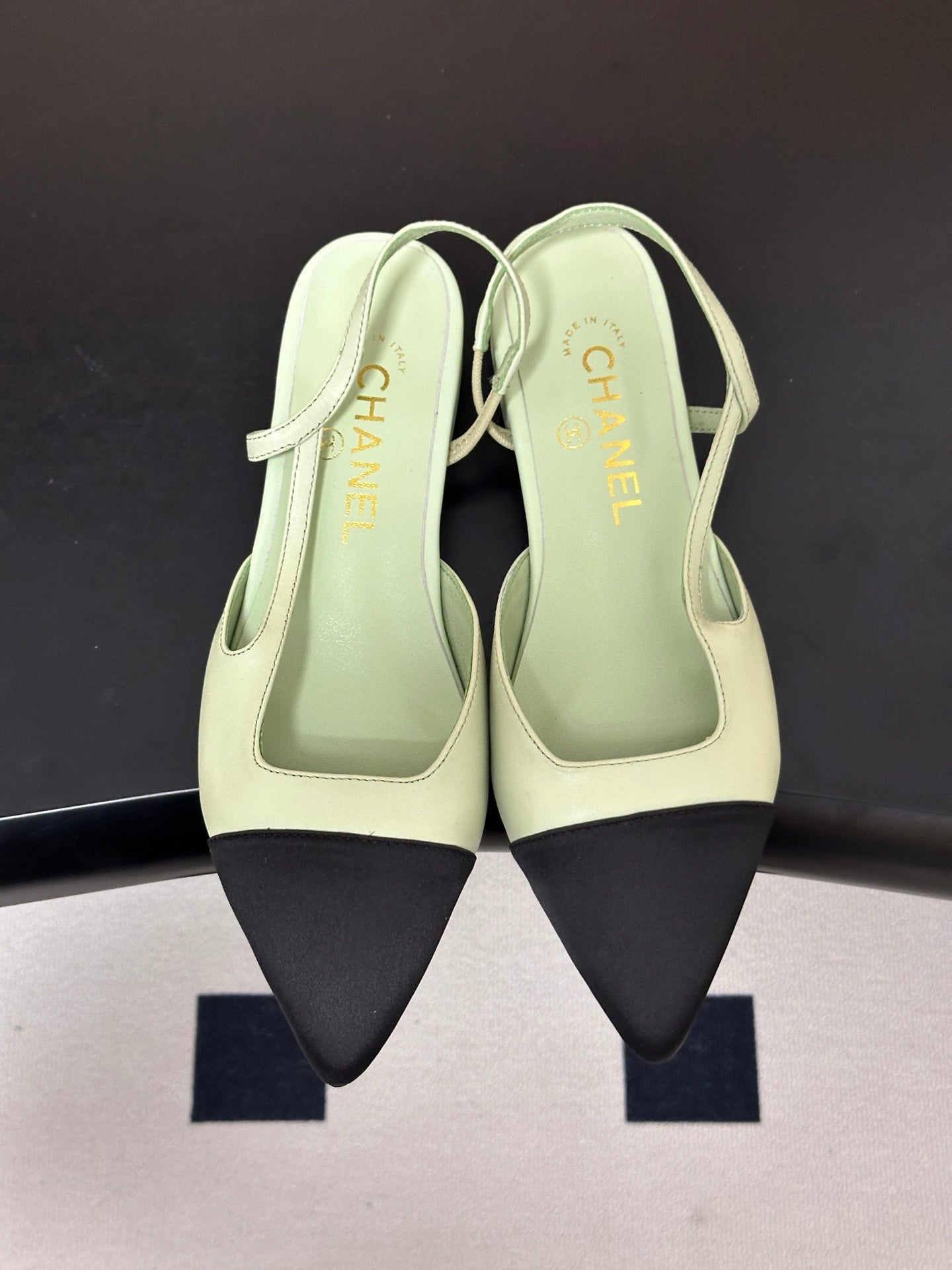CHANEL 26S POINTED TOE SLINGBACKS IN PASTEL GREEN LAMBSKIN AND BLACK FABRIC