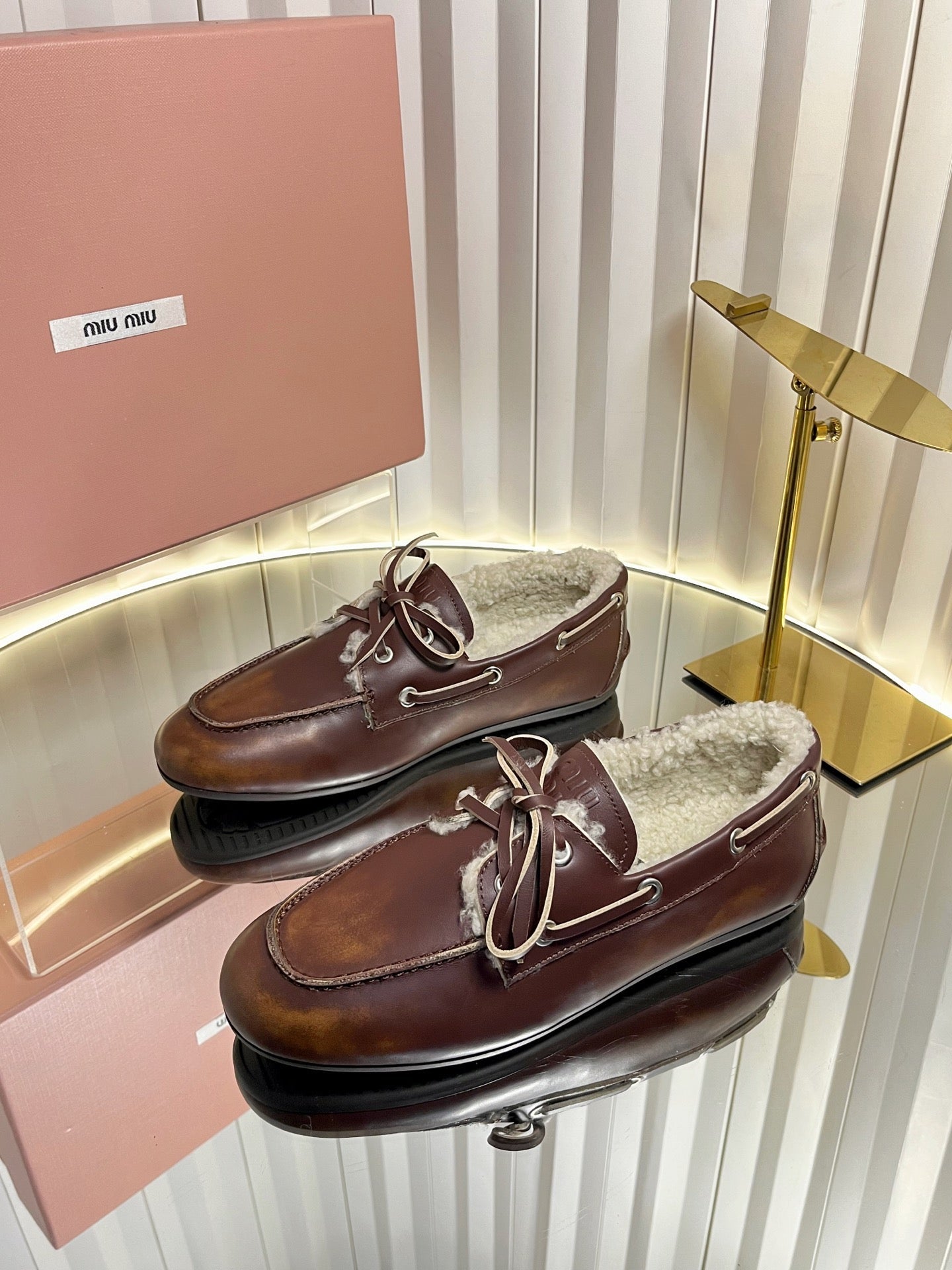 MIUMIU 26S FUR BOAT SHOES IN BROWN CALFSKIN