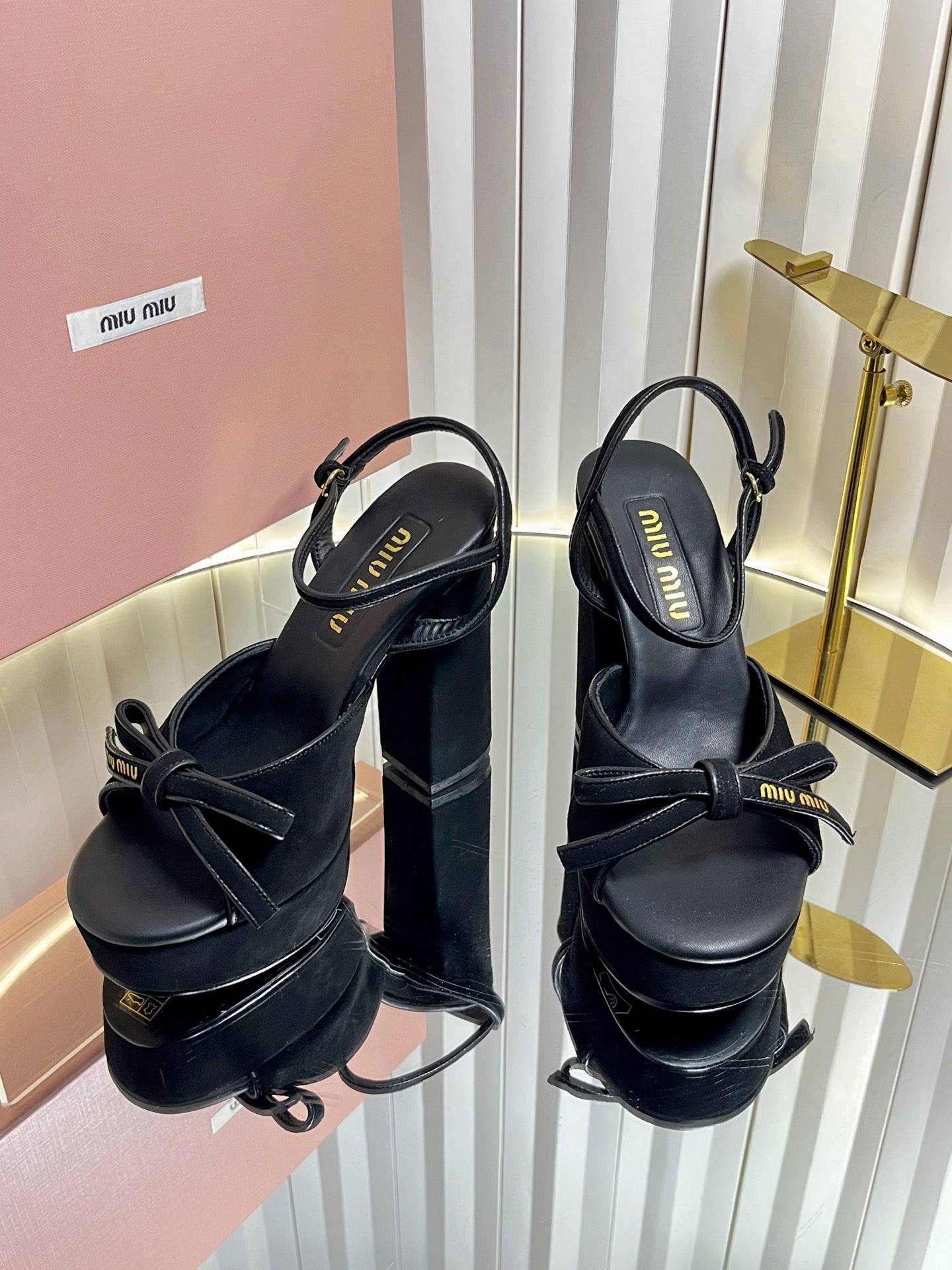 MIUMIU 26S PLATFORM ANKLE STRAP SANDALS 120MM IN BLACK SUEDE WITH BOW