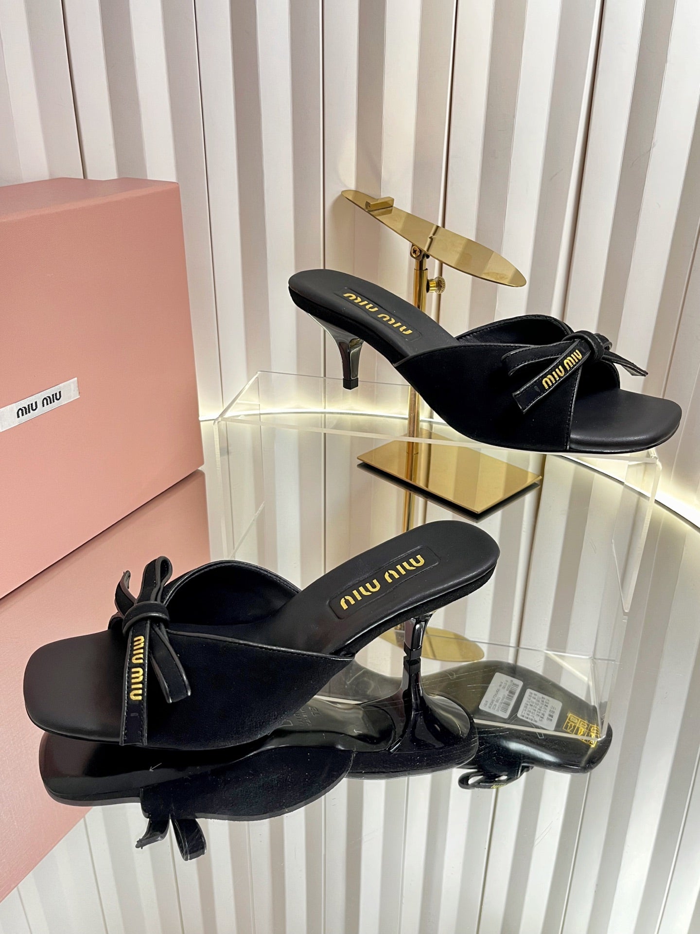 MIUMIU 26S MULE SANDALS 55MM IN BLACK SUEDE WITH BOW