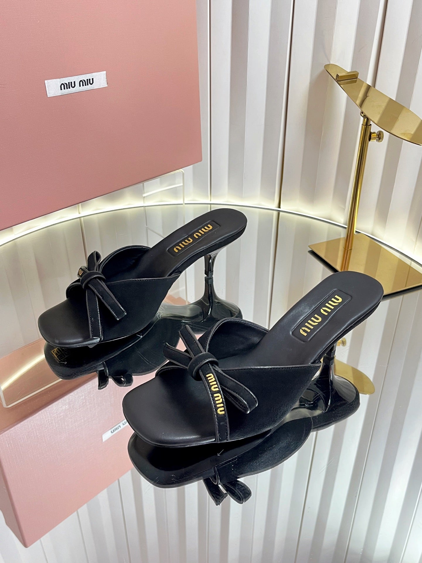 MIUMIU 26S MULE SANDALS 55MM IN BLACK SUEDE WITH BOW