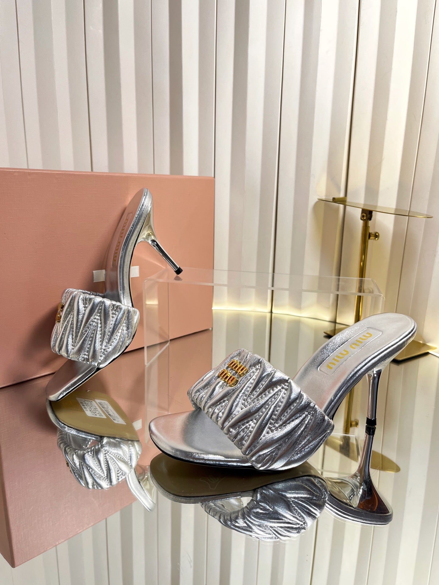 MIUMIU 26S HIGH-HEEL MULE SANDALS 85MM IN SILVER CALFSKIN GOLD HARDWARE