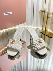 MIUMIU 26S HIGH-HEEL MULE SANDALS 85MM IN LIGHT BEIGE CALFSKIN GOLD HARDWARE