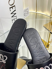 LOEWE 26S LOGO-EMBROIDERED SANDALS IN BLACK CALFSKIN