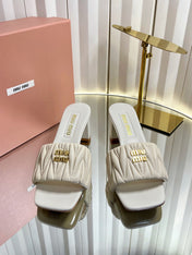 MIUMIU 26S PADDED MATELASSE MULE HEELS 65MM IN LIGHT BEIGE CALFSKIN GOLD HARDWARE