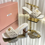 MIUMIU 26S PADDED MATELASSE MULE HEELS 65MM IN LIGHT BEIGE CALFSKIN GOLD HARDWARE
