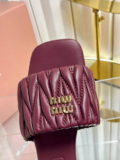 MIUMIU 26S MATELASSE SLIDES IN BURGUNDY RED CALFSKIN GOLD HARDWARE