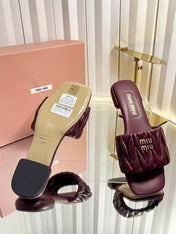 MIUMIU 26S MATELASSE SLIDES IN BURGUNDY RED CALFSKIN GOLD HARDWARE