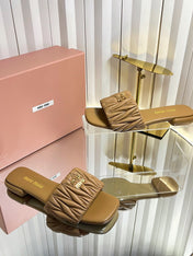 MIUMIU 26S MATELASSE SLIDES IN TAN BROWN CALFSKIN GOLD HARDWARE