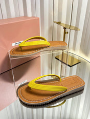 MIUMIU 26S THONG FLAT SANDALS IN YELLOW CALFSKIN