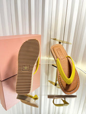 MIUMIU 26S THONG FLAT SANDALS IN YELLOW CALFSKIN