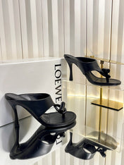 LOEWE 26S HEELED THONG SANDALS 90 MM IN BLACK CALFSKIN