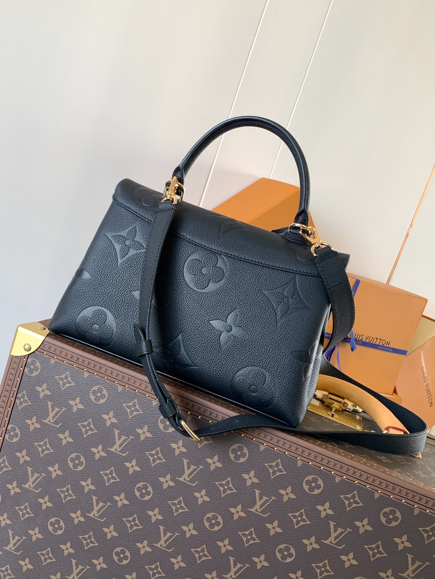 MADELEINE 30 IN BLACK MONOGRAM CALFSKIN EMBOSSED LOGO