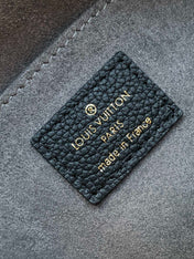 MADELEINE 30 IN BLACK MONOGRAM CALFSKIN EMBOSSED LOGO