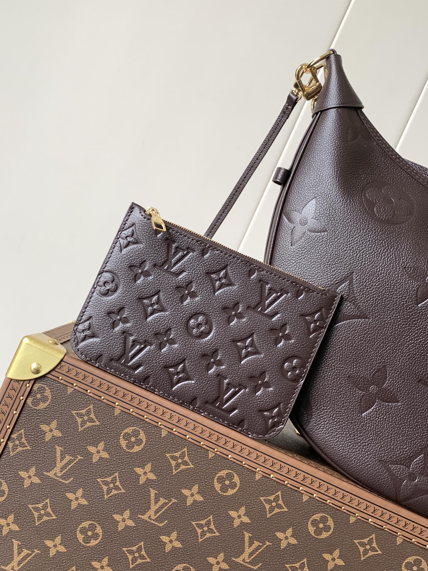 LOOP HOBO 38 IN DARK BROWN MONOGRAM CALFSKIN EMBOSSED LOGO