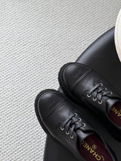 CHANEL 26S LACE UP PLATFORM IN BLACK CALFSKIN