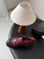 CHANEL 26S LACE UP PLATFORM IN BLACK AND RED CALFSKIN