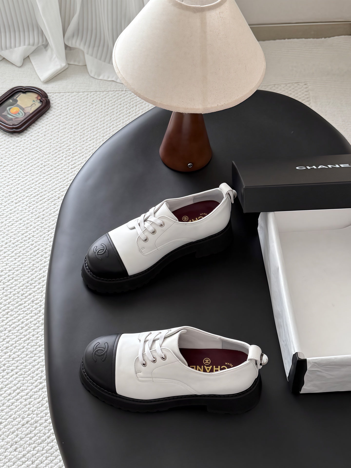 CHANEL 26S LACE UP PLATFORM IN BLACK AND WHITE CALFSKIN