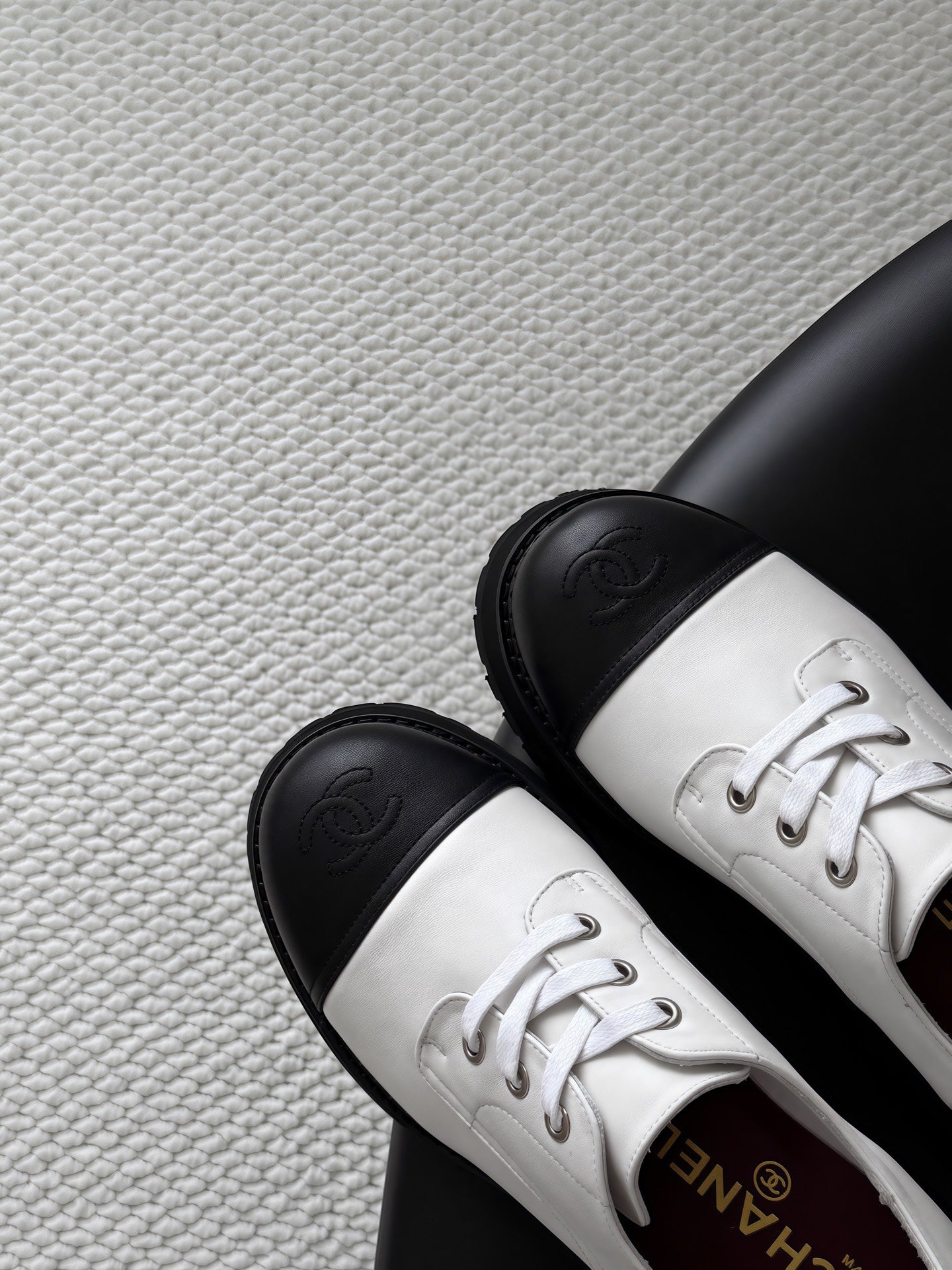 CHANEL 26S LACE UP PLATFORM IN BLACK AND WHITE CALFSKIN