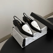 CHANEL 26S SLINGBACK FLAT IN BLACK AND WHITE CALFSKIN WITH CC LOGO