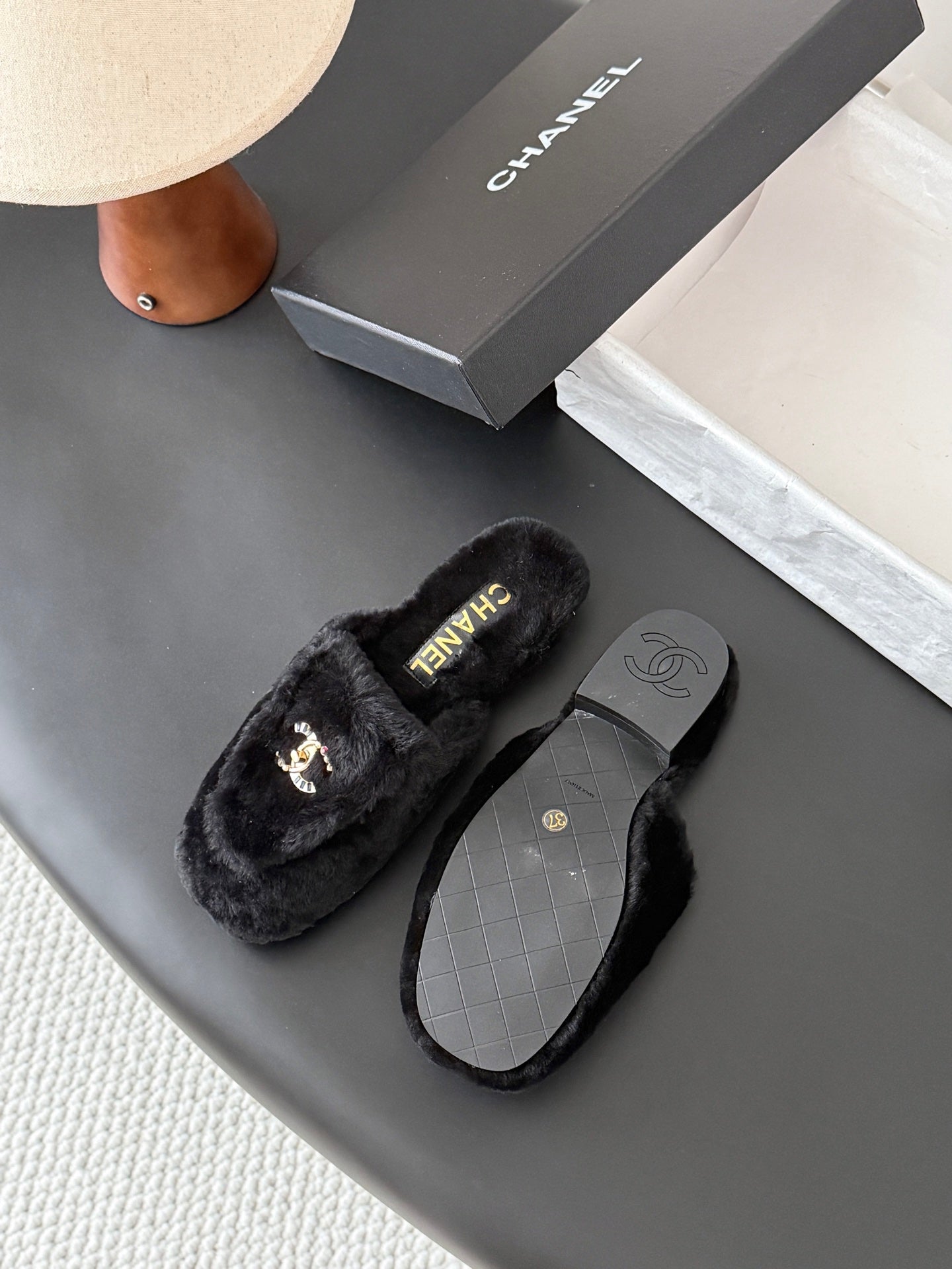 CHANEL 26S MULES IN BLACK SHEARLING LINING