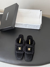CHANEL 26S MULES IN BLACK SHEARLING AND SUEDE