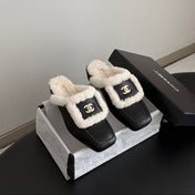 CHANEL 26S MULES IN BLACK SHEARLING AND CALFSKIN