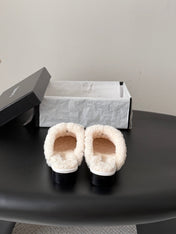 CHANEL 26S MULES IN WHITE SHEARLING AND CALFSKIN