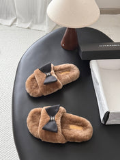 CHANEL 26S SLIDE SANDALS IN BROWN SHEARLING WITH BLACK BOW
