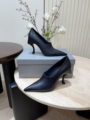 CURVED HEEL DEEP MOUTH PUMPS IN BLACK CALFSKIN