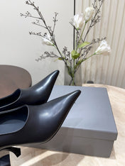 CURVED HEEL DEEP MOUTH PUMPS IN BLACK CALFSKIN