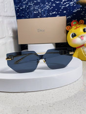 MONTAIGNE SUNGLASS 563194 IN GOLD METAL GREY LENSES