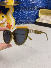 CAT EYE SUNGLASSES 567469 IN GREEN CLEAR ACETATE