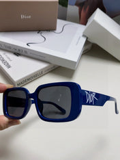 MONTAIGNE SUNGLASS 571595 IN BLUE ACETATE TEXT LOGO