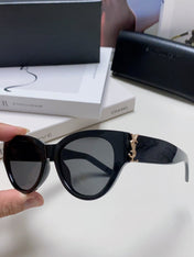 YSL CAT-EYE SUNGLASSES IN BLACK ACETATE WITH GOLD LOGO DETAIL
