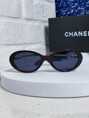 OVAL SUNGLASSES 640344 IN BLACK RED ACETATE METAL FRAME EMBOSSED PEARL